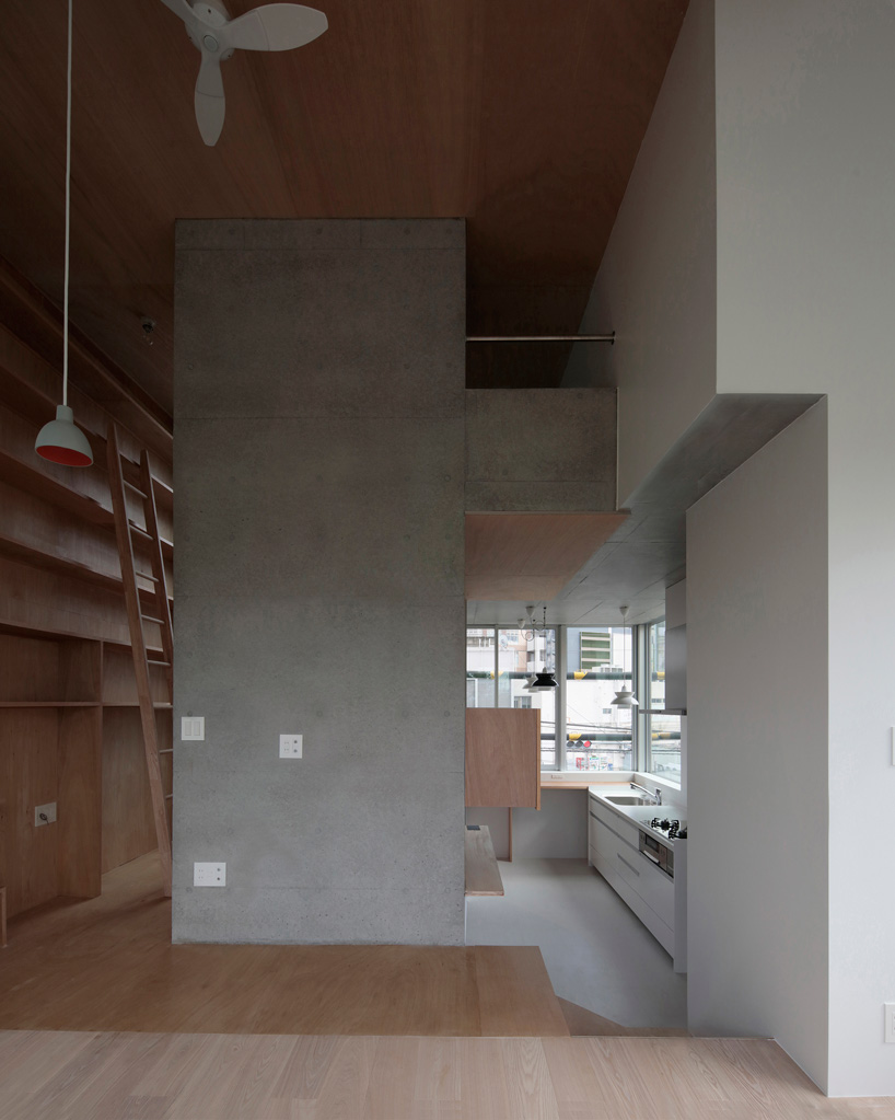 ondesign partners builds compact urban cabin with concrete and wood in tokyo