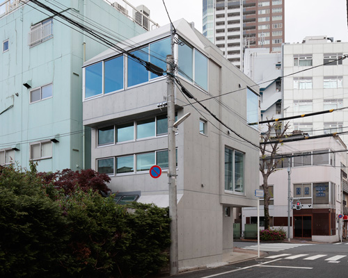 ondesign partners builds compact urban cabin with concrete and wood in tokyo