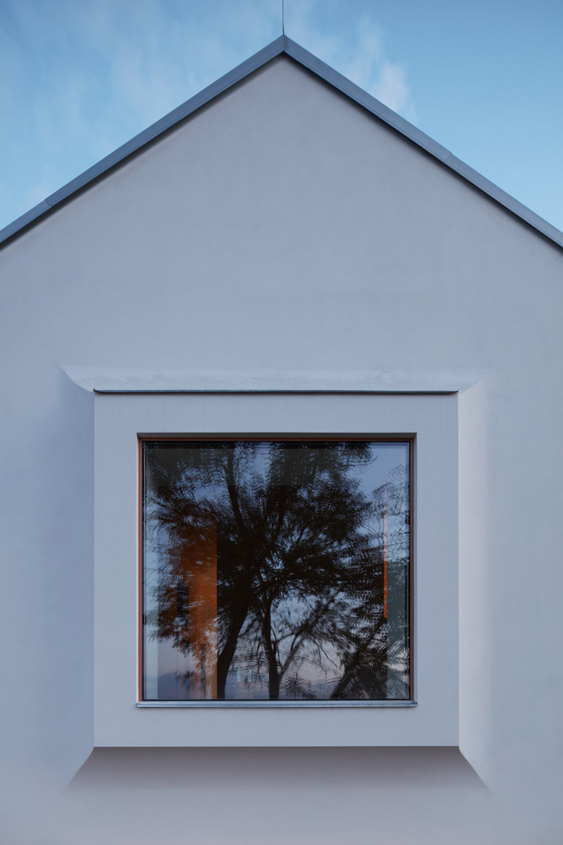 ORA plans rural house in the czech countryside with gable roof and bay window