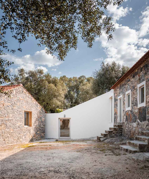 phyd arquitectura connects stone ruins to create contemporary house in portugal