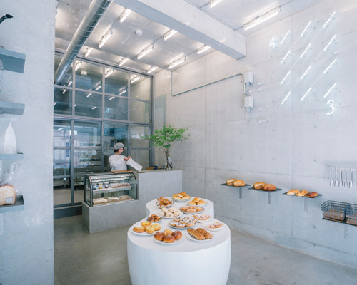 fathom designs japanese bakery ripi as a continuous space of concrete and glass