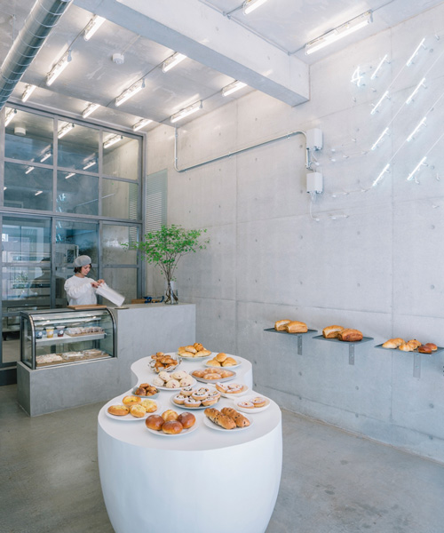 fathom designs japanese bakery ripi as a continuous space of concrete and glass