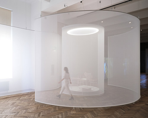 some place studios' ethereal screens lead viewers through exhibition in vienna