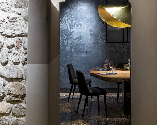 visual display carefully restores the 150 year old 'vitello d'oro' restaurant in udine, italy