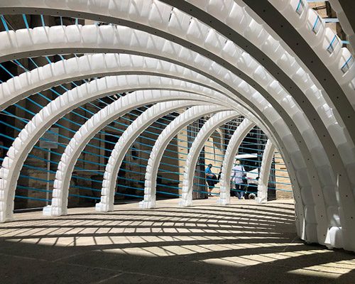 'the big wav(st)e' uses recycled water jugs to raise awareness of plastic pollution in france