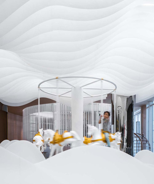 wutopia lab fills kids cafe with dreamy cloudscape in china