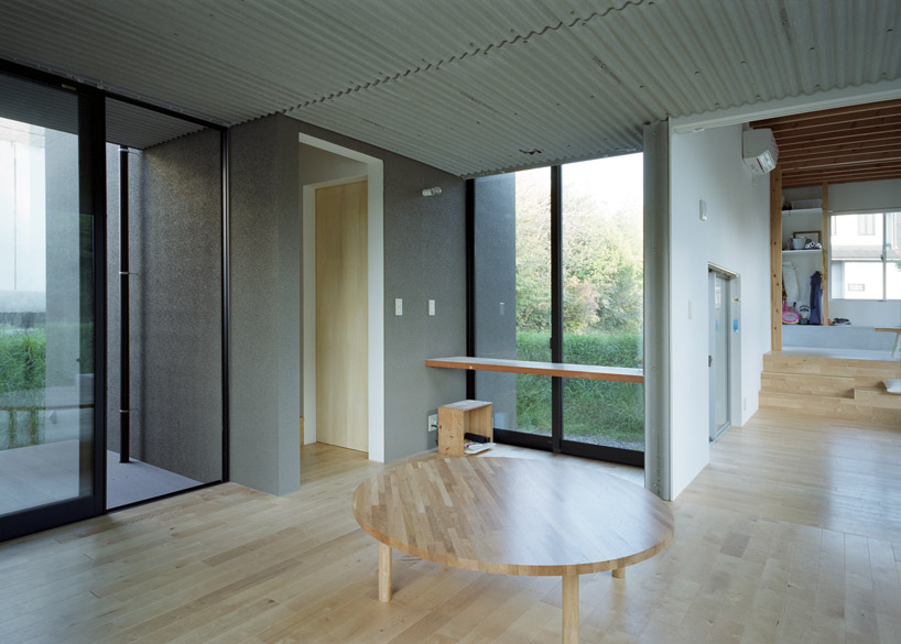 fujiwaramuro architects encircles house inside a greenery ring in japan