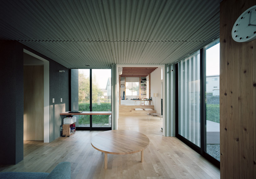fujiwaramuro architects encircles house inside a greenery ring in japan