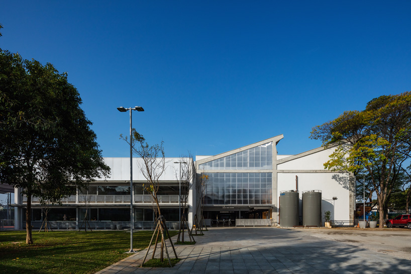 andrade morettin arquitectos repurposes sheds into beacon school in brazil