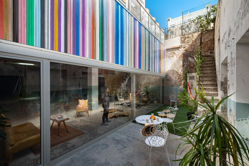 barcelona facade combining non-binary gender flags expresses diversity