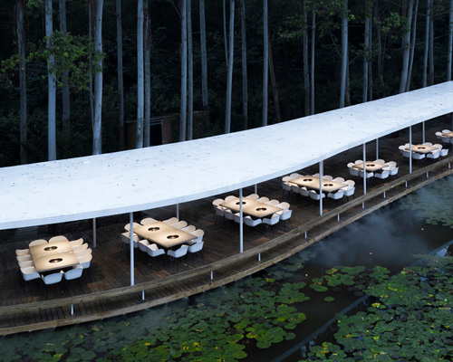 hotpot restaurant by MUDA-architects weaves its way through a eucalyptus forest