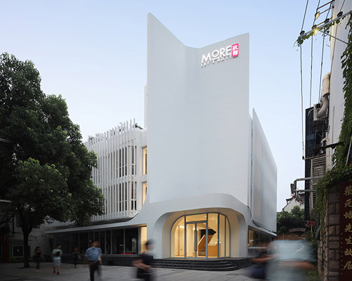 archunits softens renovated shanghai office building by adding a sculptural staircase