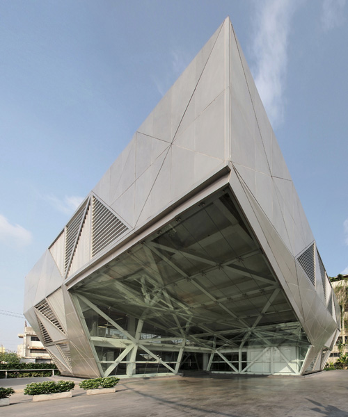 ASWA wraps the bitwise headquarters in thailand in a geometric, multi-faceted exterior shell