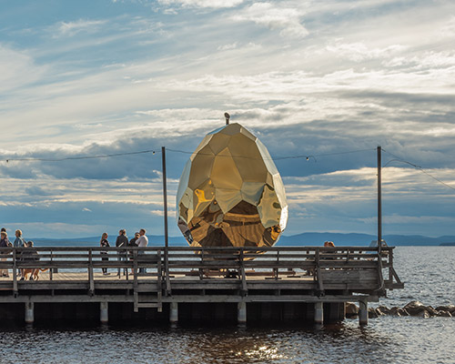 bigert & bergström's solar egg, a golden mirrored sauna, returns to sweden