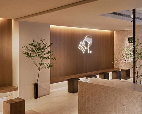 bloomdesign's modern tea shop in china references traditional paintings