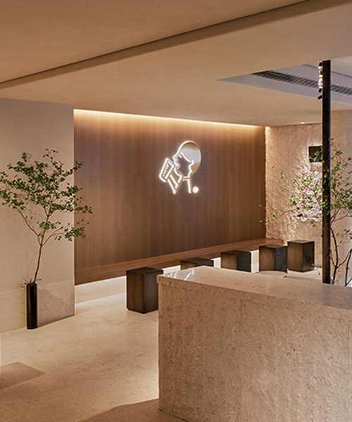 bloomdesign's modern tea shop in china references traditional paintings