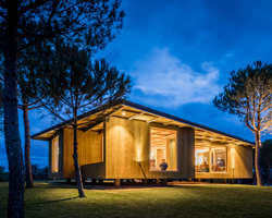 carlos castanheira's barrocas house expansion includes an elevated timber pavilion