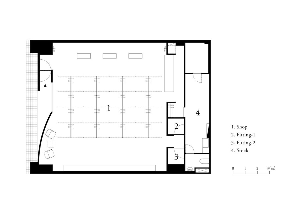 CASE-REAL suspends clothes on V-shaped metal racks at the côte à côte boutique