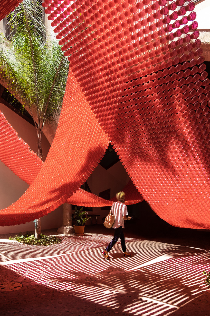 manuel bouzas + santiago de aguila install catenary meshes in a flores & prats building