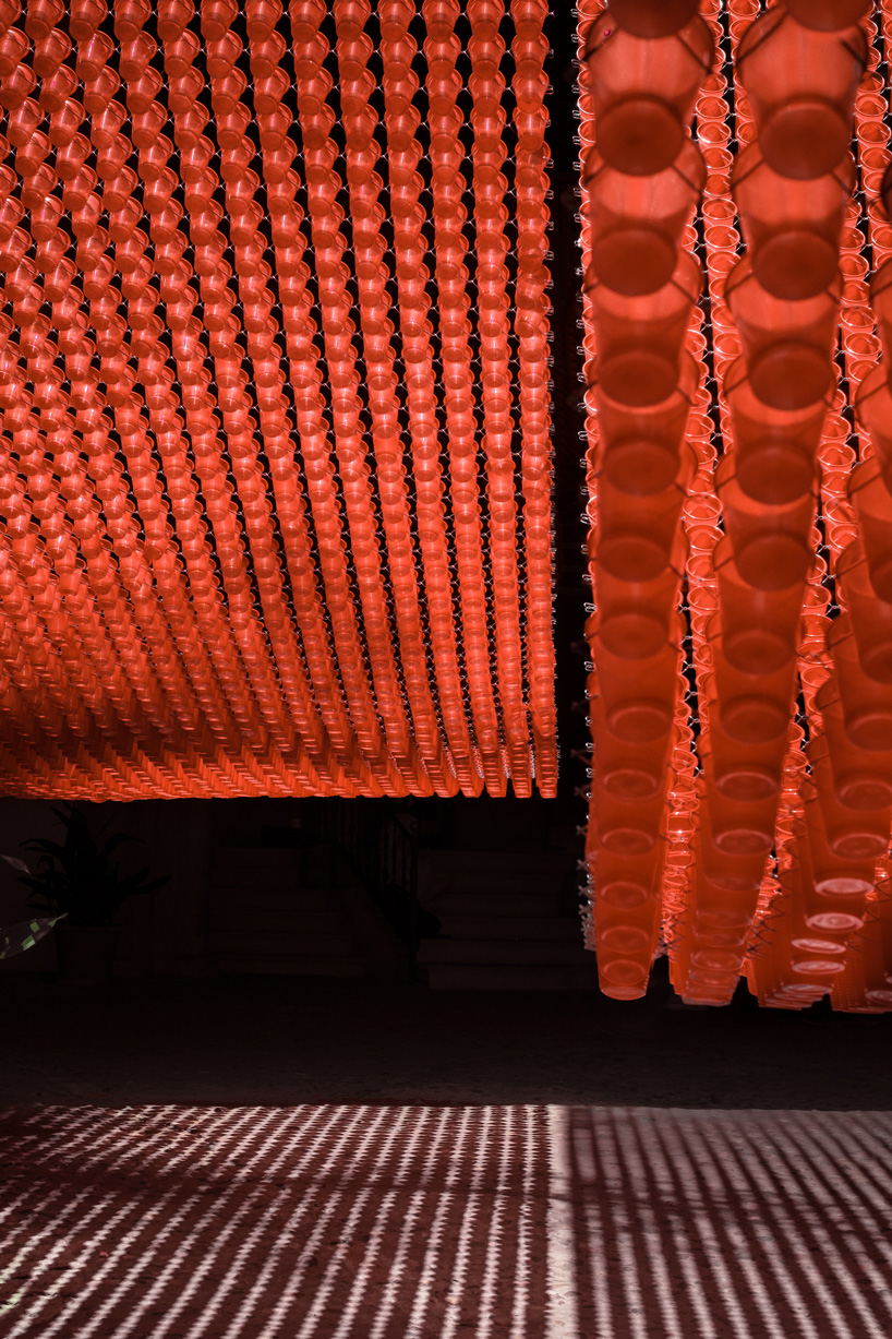 manuel bouzas + santiago de aguila install catenary meshes in a flores & prats building