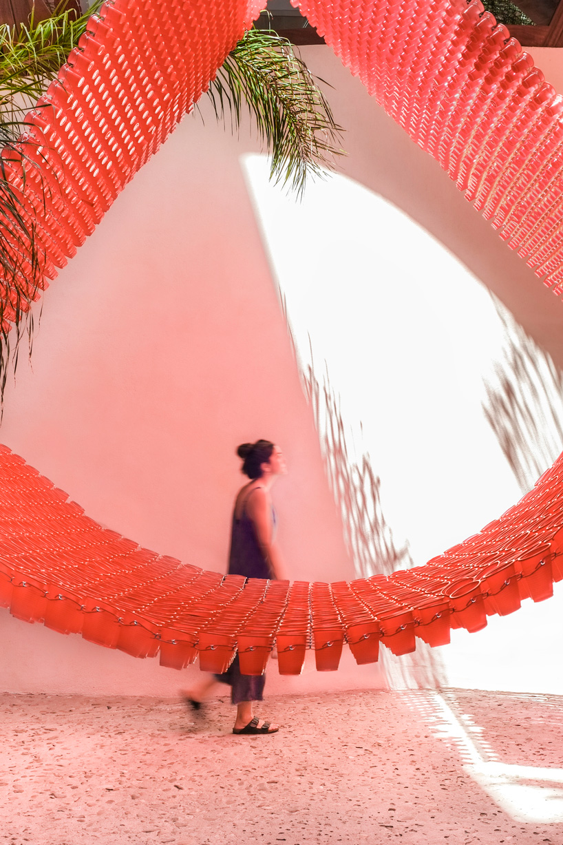 manuel bouzas + santiago de aguila install catenary meshes in a flores & prats building
