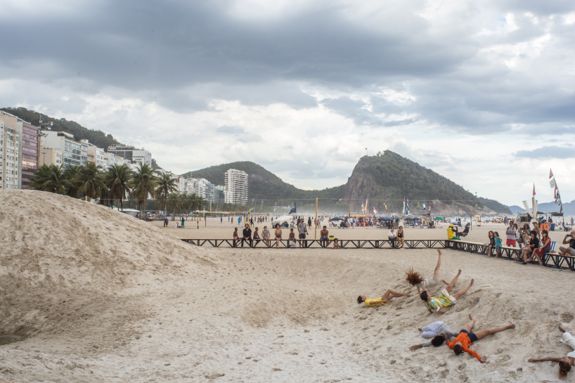 pedro varella's copacabana beach installation results in a new topographic landscape