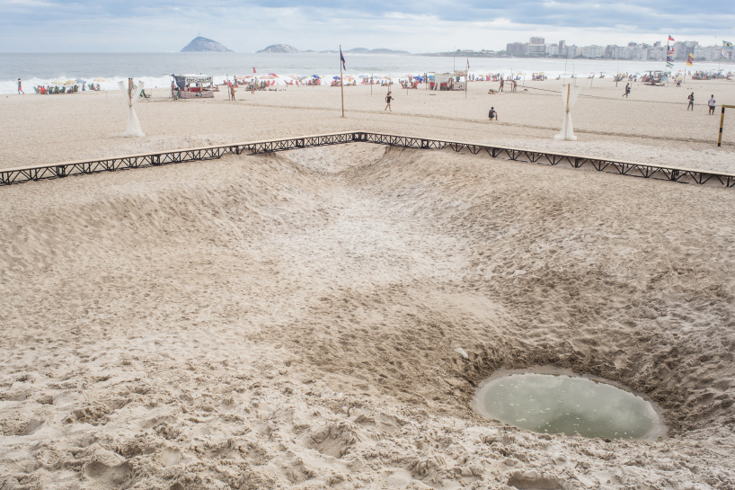 pedro varella's copacabana beach installation results in a new topographic landscape
