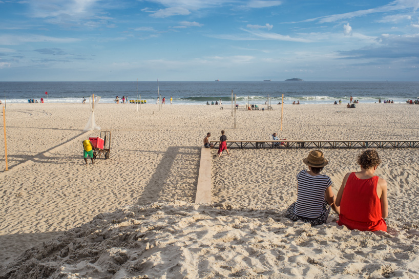 pedro varella's copacabana beach installation results in a new topographic landscape