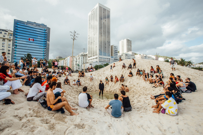 pedro varella's copacabana beach installation results in a new topographic landscape