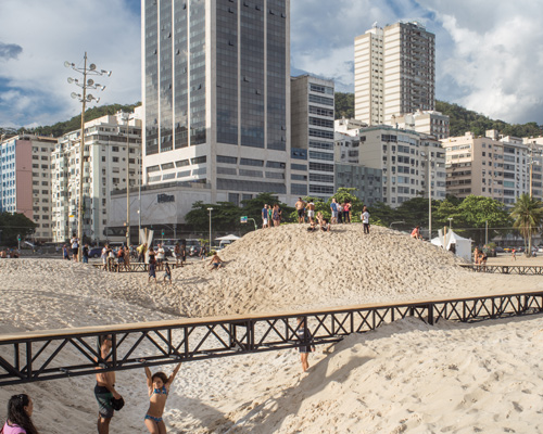 pedro varella's copacabana beach installation results in a new topographic landscape