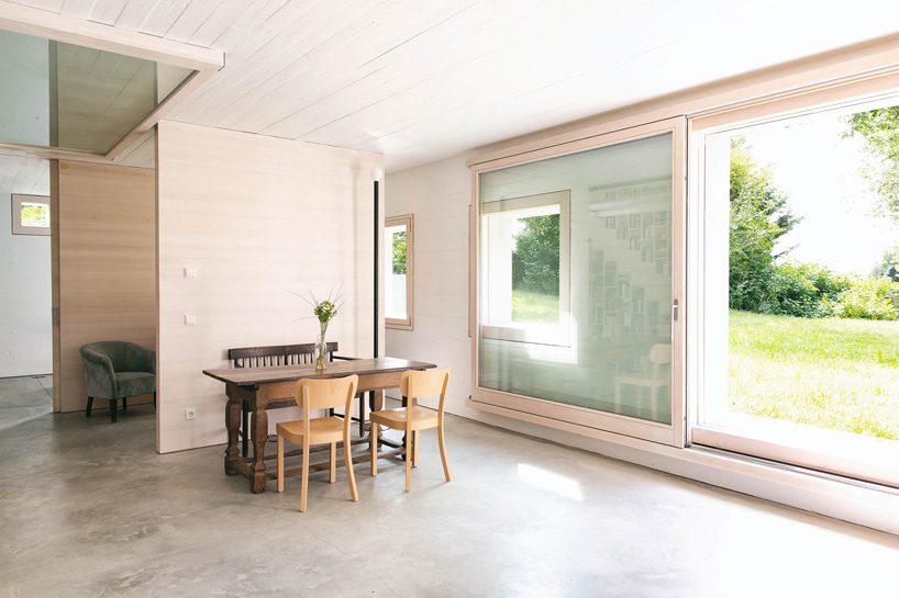 jurek brueggen + kosa architects convert stone to house that adapts to all seasons