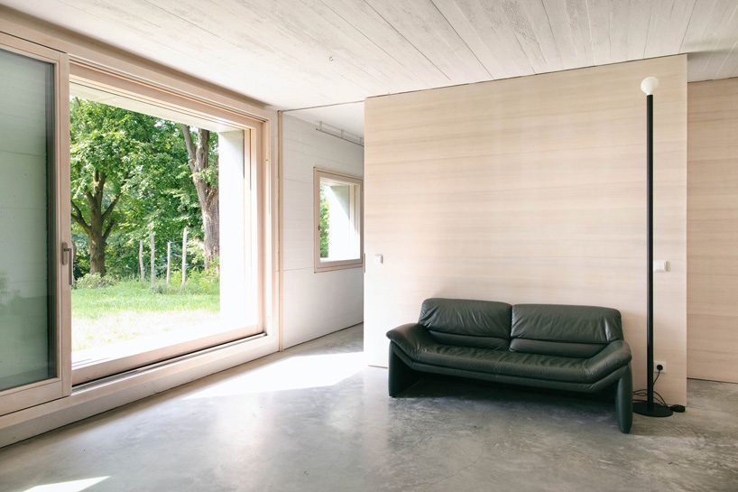 jurek brueggen + kosa architects convert stone to house that adapts to all seasons