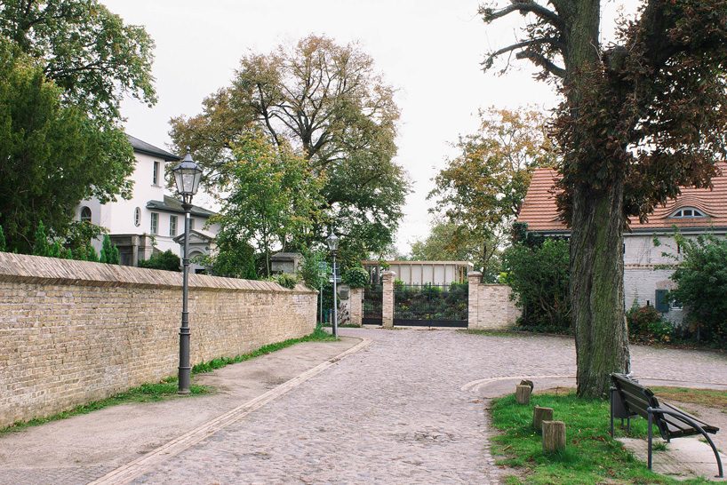 jurek brueggen + kosa architects convert stone to house that adapts to all seasons