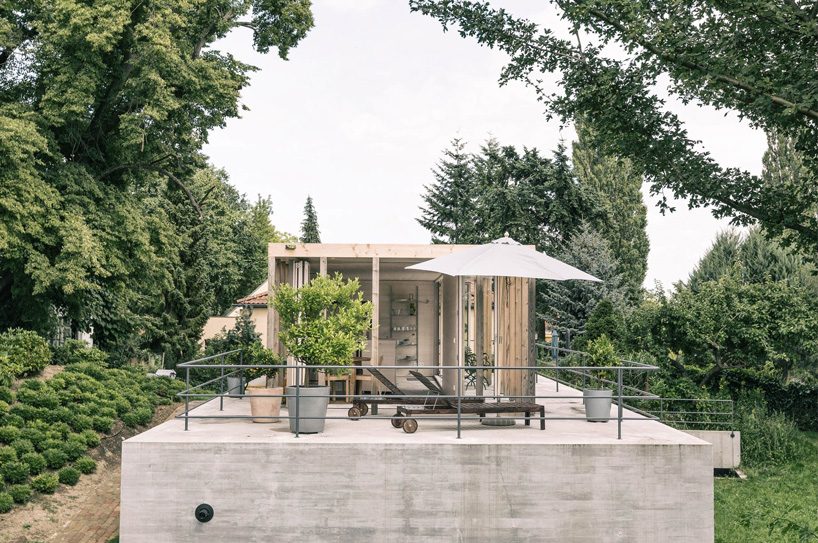 jurek brueggen + kosa architects convert stone to house that adapts to all seasons