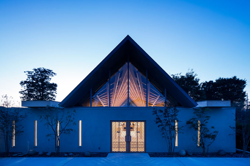 buddhist temple in japan expresses radiating timber roof structure