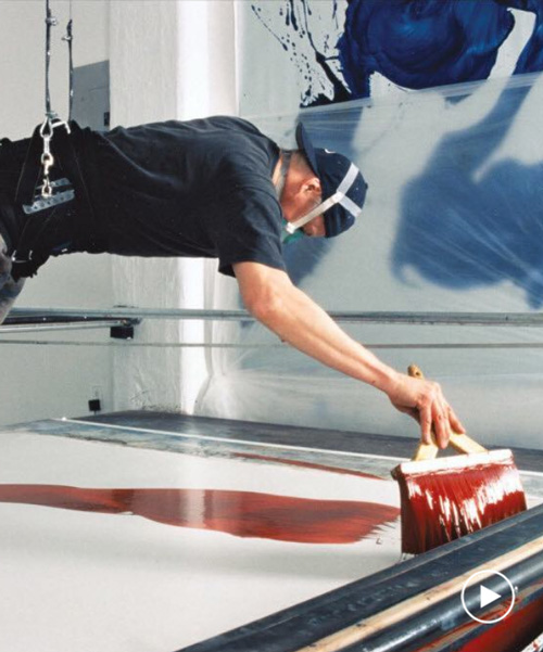 james nares suspends himself over the canvas to create large-scale, single-swipe paintings