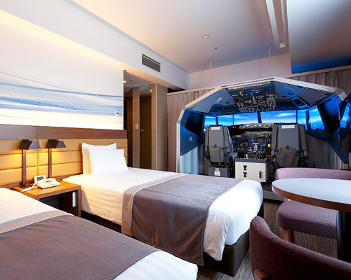 japanese hotel features a lifesize flight simulator in one of its rooms
