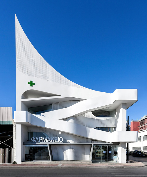 klab architecture completes pharmacy with triangular perforated façade in piraeus, greece