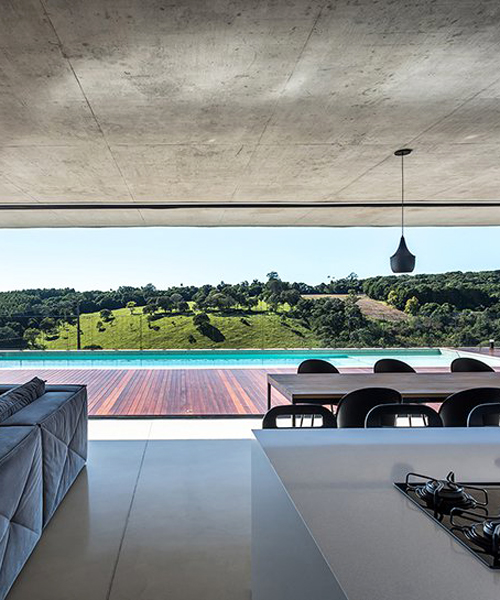 michel macedo arquitetos builds a concrete house with panoramic views in brazil