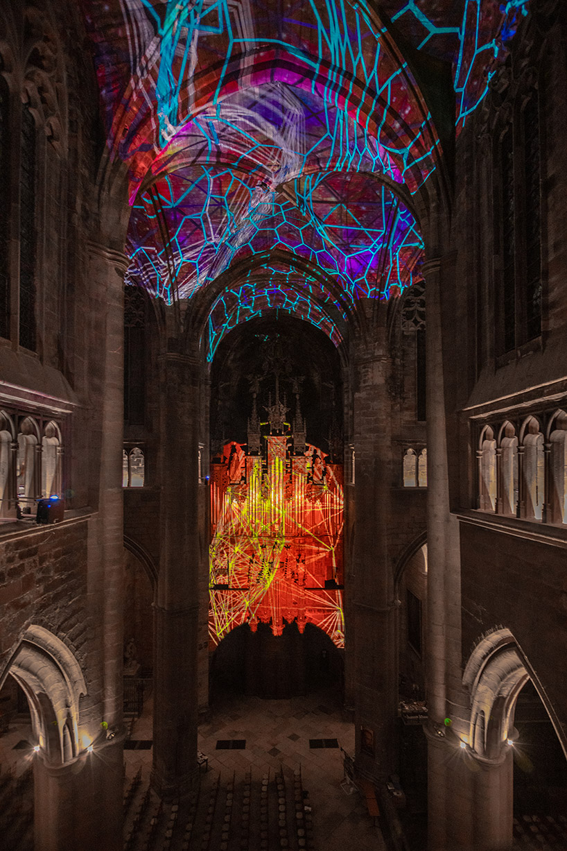 miguel chevalier projects explosions of massive stars onto france's rodez cathedral