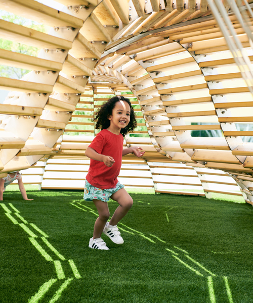 NEST is a sculptural playscape built using reclaimed wood from NYC water towers