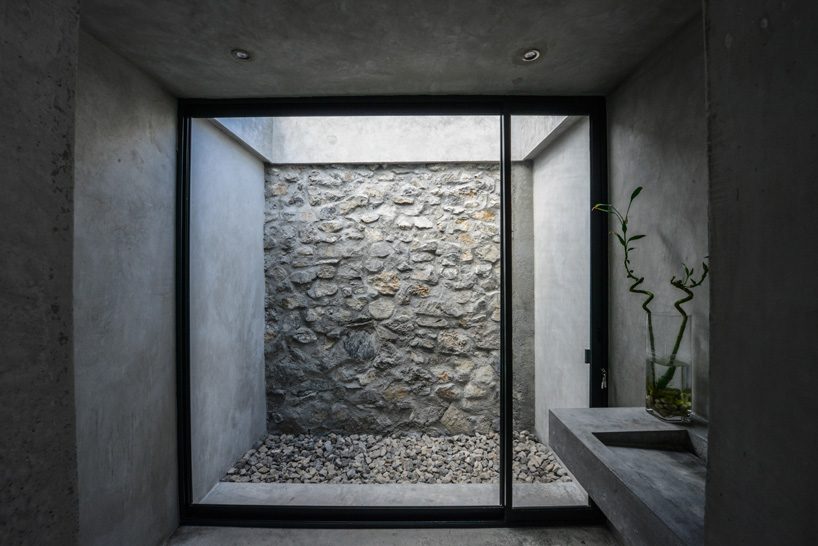p+0 arquitectura combines concrete and stone in the 'bedolla' house in mexico