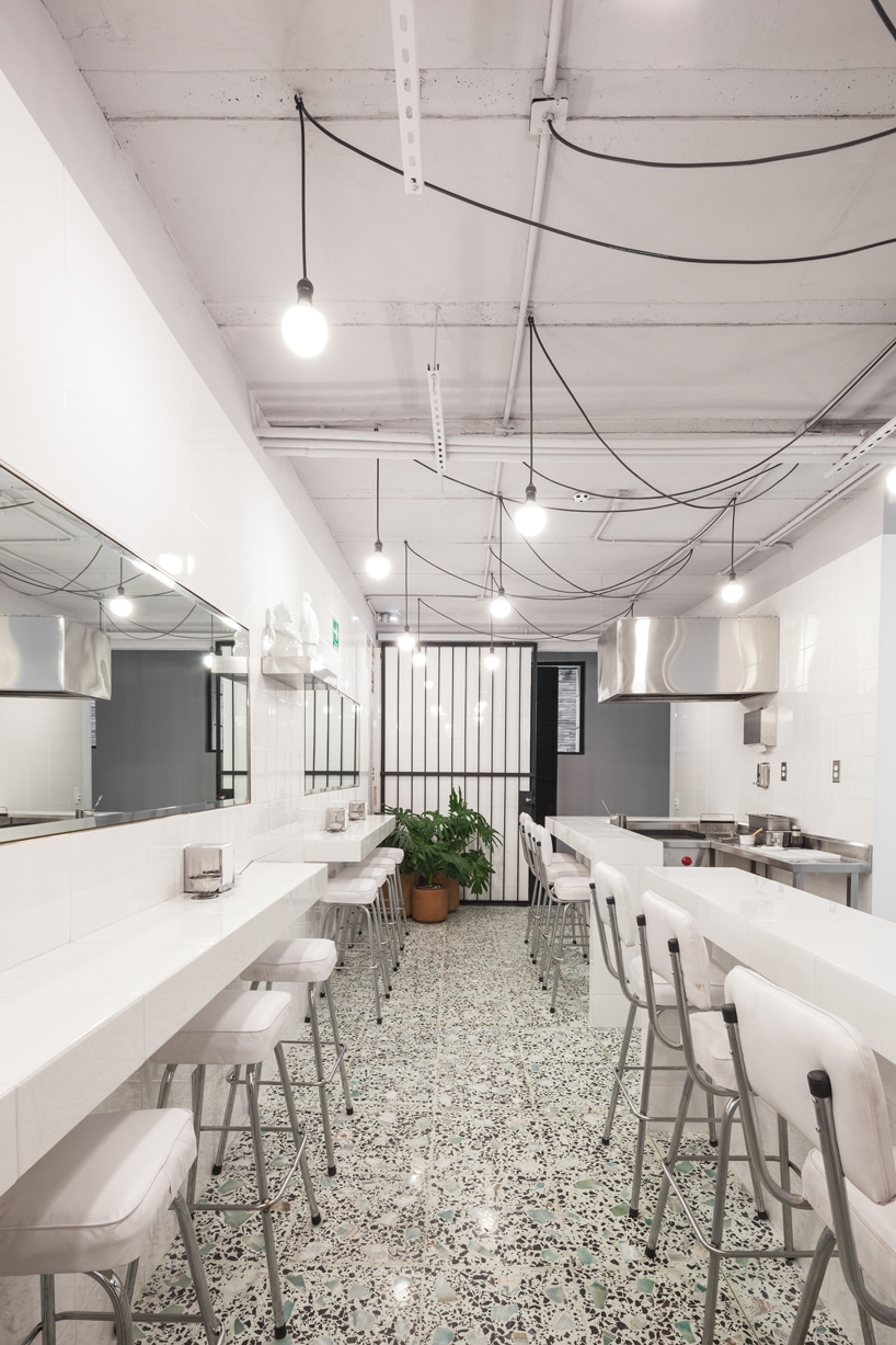 dosa studio + TAAC transform early 20th century manor into taco restaurant in mexico city