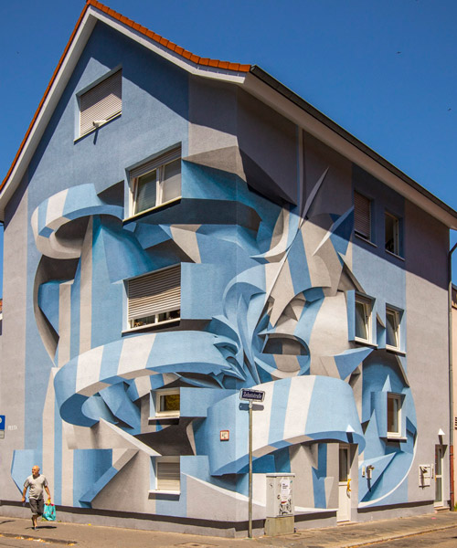 peeta paints large-scale optical illusion murals to transform buildings