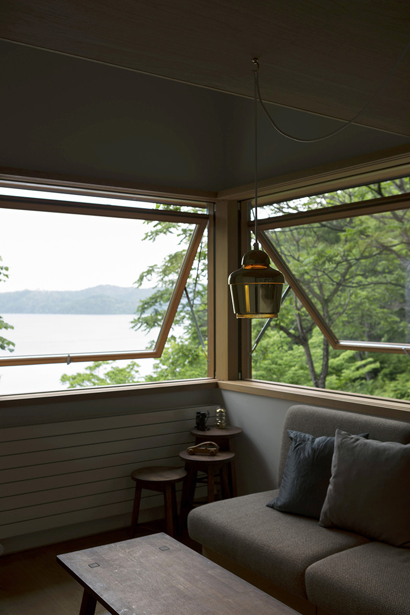 yashima architect & associates builds 37 sqm weekend house on the shores of japanese lake