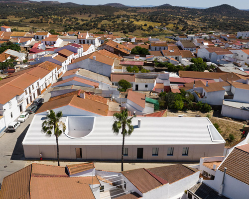 studio wet constructs family house with 40-meter-long brick façade in alosno, spain