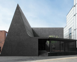 WGNB combines a black circle, quadrangle + triangle for the flagship store of juun.j in seoul