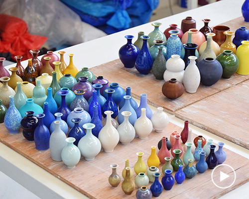 artist yuta segawa hand-throws thousands of tiny ceramic vases