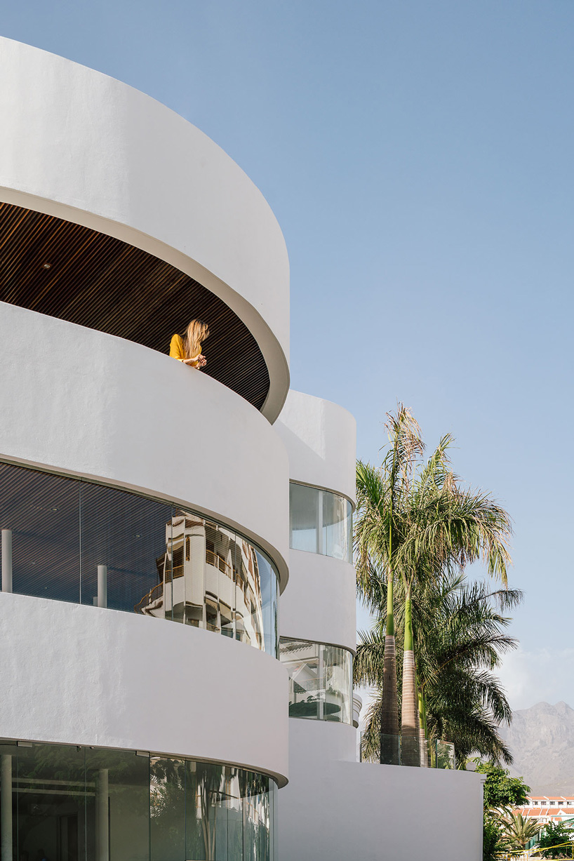 zooco estudio's flamingo club hotel in tenerife combines bamboo, basalt stone + white hues