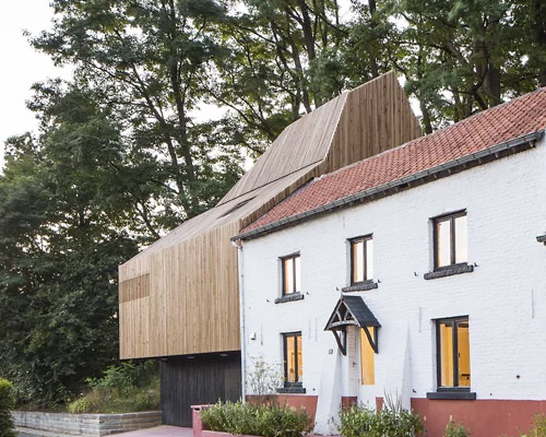 louis paillard adds wood-clad extension to 19th-century house in waterloo, belgium